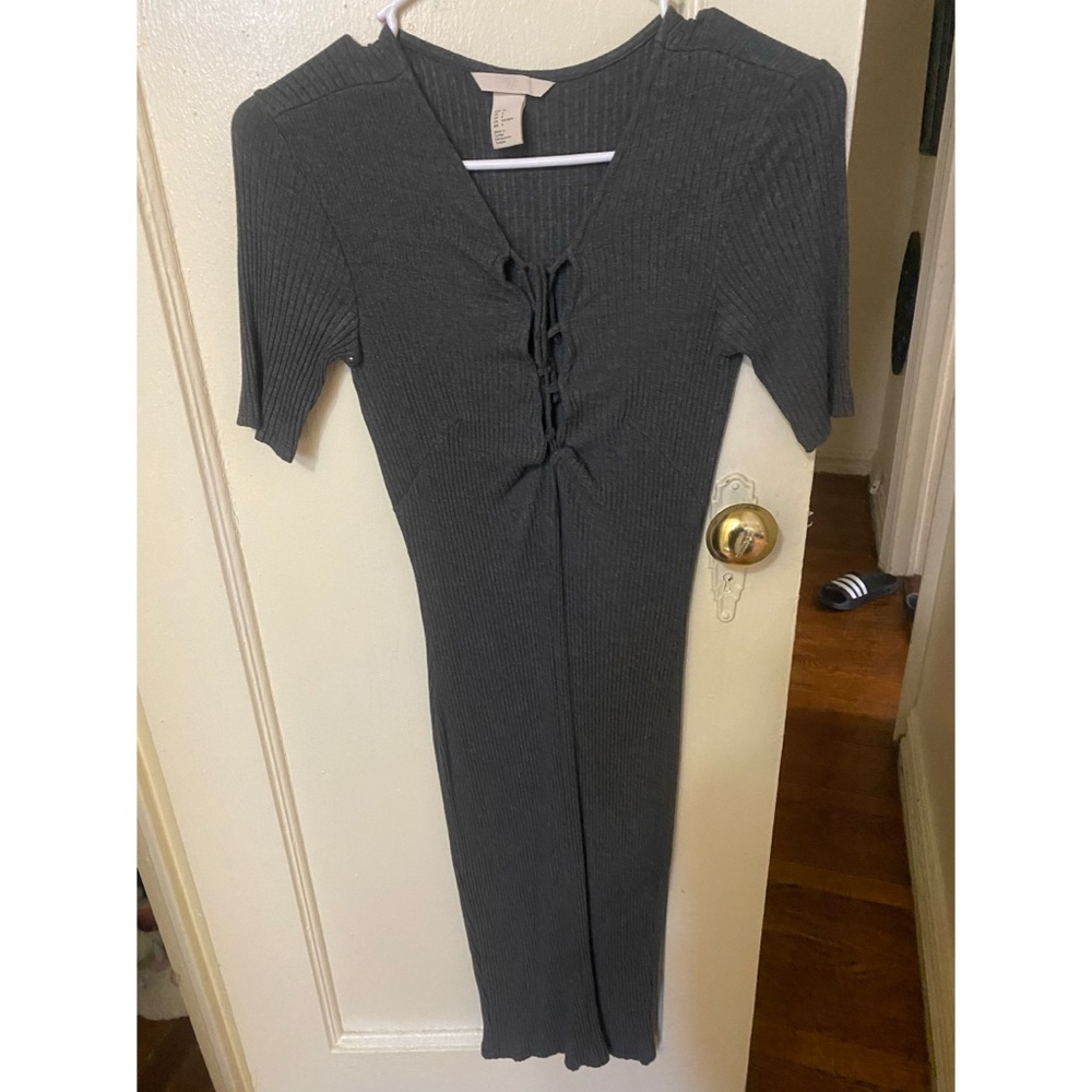 Cute ribbed cotton dress. Laces in front